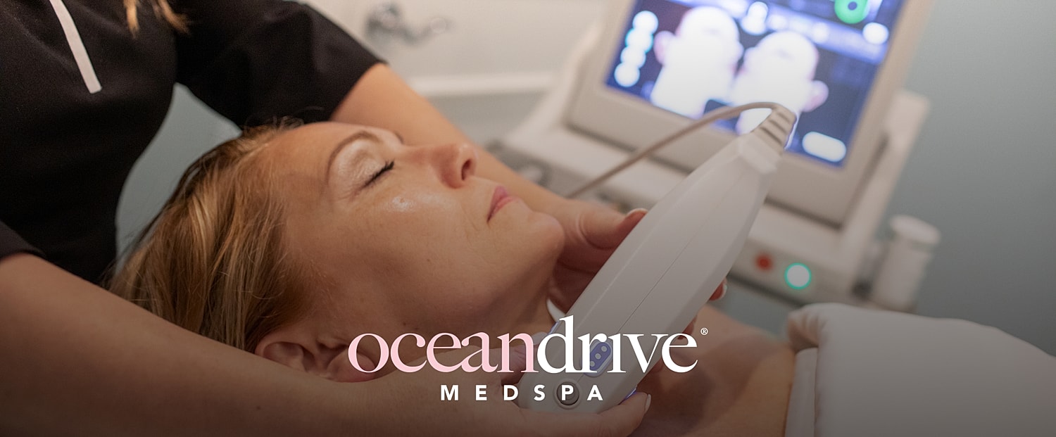 Woman receiving facial treatment at medspa.